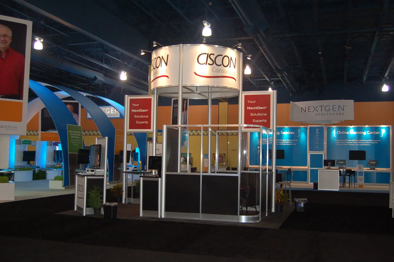 Trade show booth with company logos