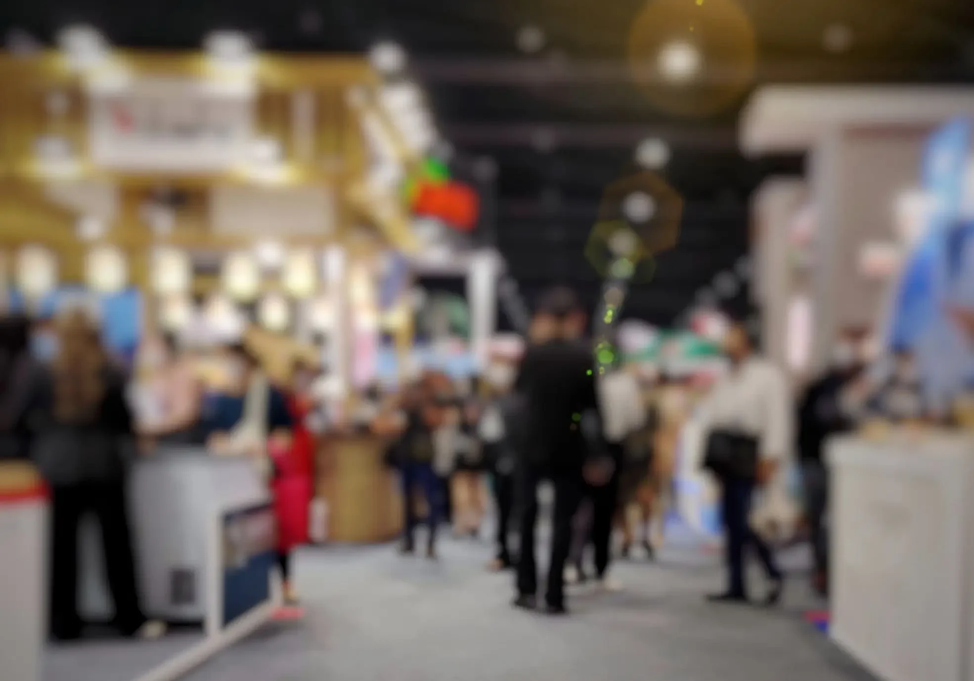 Blurred trade show with people walking